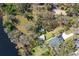 Aerial view of waterfront property with houses at 6605 N Boulevard, Tampa, FL 33604