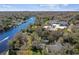 Aerial view of waterfront property with homes and marina at 6605 N Boulevard, Tampa, FL 33604