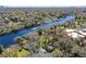 Waterfront property with lush landscaping and boat access at 6605 N Boulevard, Tampa, FL 33604