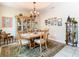 Elegant dining room featuring a wood table and matching hutch at 29405 Cochiti Lake Dr, San Antonio, FL 33576