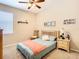 Cozy bedroom with a double bed and light color scheme at 29405 Cochiti Lake Dr, San Antonio, FL 33576
