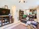 Living room with leather furniture and views into the kitchen at 29405 Cochiti Lake Dr, San Antonio, FL 33576