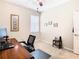 Bright home office features a desk, chair, and ample natural light at 29405 Cochiti Lake Dr, San Antonio, FL 33576
