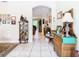 Bright and spacious entryway with decorative furniture and Gathering photos at 29405 Cochiti Lake Dr, San Antonio, FL 33576