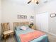 Bedroom with double bed, built-in closet, and dresser at 29405 Cochiti Lake Dr, San Antonio, FL 33576
