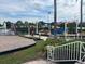 Relaxing community space by the lake with seating and play area at 11412 Bridge Pine Dr, Riverview, FL 33569