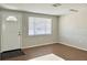 Bright living room with tile floors and neutral walls at 3615 Wellington Dr, Holiday, FL 34691