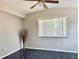 Bright bonus room with tile floors and large window at 3615 Wellington Dr, Holiday, FL 34691