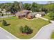 Aerial view of a two-story house with a large yard at 849 John Cressler Dr, Seffner, FL 33584