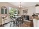 Charming dining area with table and chairs near a window at 849 John Cressler Dr, Seffner, FL 33584