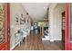 Entryway with hardwood floors, staircase, and seating area at 849 John Cressler Dr, Seffner, FL 33584