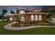 Two-story house with landscaped yard, walkway, and attached garage at 849 John Cressler Dr, Seffner, FL 33584