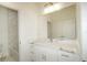 Modern bathroom with white vanity and marble-look shower at 2603 S 70Th St, Tampa, FL 33619