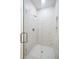 Modern shower with marble-look tile and built-in niche at 2603 S 70Th St, Tampa, FL 33619