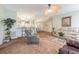 Spacious living room features a view into the kitchen and dining area at 37607 Neukom Ave, Zephyrhills, FL 33541
