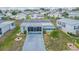 Single Gathering home with carport and screened porch at 37607 Neukom Ave, Zephyrhills, FL 33541