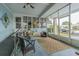 Spacious screened porch offers a peaceful outdoor sitting area at 37607 Neukom Ave, Zephyrhills, FL 33541