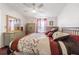 Main bedroom with a queen-size bed and built-in dresser at 37607 Neukom Ave, Zephyrhills, FL 33541