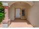 Inviting front entrance with arched entryway and sidelight window at 12814 Cattail Shore Ln, Riverview, FL 33579