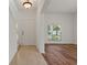 Bright and airy entryway with tile flooring and access to living room at 12814 Cattail Shore Ln, Riverview, FL 33579