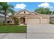 Charming one-story home with three-car garage at 12814 Cattail Shore Ln, Riverview, FL 33579