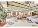 Elegant banquet hall with chandeliers, tables set for a formal event at 1007 Emerald Dunes Dr, Sun City Center, FL 33573