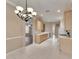Open kitchen with ample counter space, updated appliances, and a view into the adjacent living area at 1007 Emerald Dunes Dr, Sun City Center, FL 33573