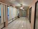 Sunroom with tiled floors and multiple windows at 22491 Delhi Ave, Port Charlotte, FL 33952
