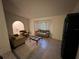 Living room with neutral color palette and bay window at 22491 Delhi Ave, Port Charlotte, FL 33952