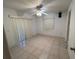 Empty bedroom with tile floors and sliding glass doors at 22491 Delhi Ave, Port Charlotte, FL 33952