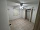Bright bedroom with tile floors and a spacious closet at 22491 Delhi Ave, Port Charlotte, FL 33952