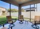 Relaxing screened patio with comfortable seating at 1953 Nature View Dr, Lutz, FL 33558