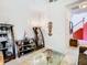 Bright living room with built-in shelving and view to staircase at 1953 Nature View Dr, Lutz, FL 33558