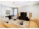 Open living room with stylish furnishings and ample natural light at 1953 Nature View Dr, Lutz, FL 33558