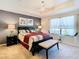 Spacious bedroom with king-size bed and accent wall at 1953 Nature View Dr, Lutz, FL 33558