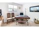 Functional home office with a large desk and two chairs at 1953 Nature View Dr, Lutz, FL 33558