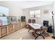 Bright home office with built-in cabinetry and desk at 1953 Nature View Dr, Lutz, FL 33558