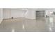 Finished garage with epoxy flooring and ample storage space at 1526 5Th S St, St Petersburg, FL 33701