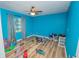 Blue bedroom with plenty of floor space at 4805 Bugg Rd, Plant City, FL 33567