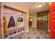 Inviting entryway with built-in bench seating and storage at 4805 Bugg Rd, Plant City, FL 33567