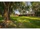 Ranch-style home nestled under large oak trees at 4805 Bugg Rd, Plant City, FL 33567