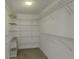 Large walk-in closet with wire shelving for ample storage at 700 Starkey Rd # 643, Largo, FL 33771