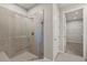 Modern bathroom with a large glass shower at 809 Snail Kite Pl, Sun City Center, FL 33573