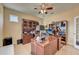 Spacious home office with built-in shelving and hardwood floors at 6619 Current Dr, Apollo Beach, FL 33572