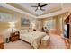 Large main bedroom with bay window and ceiling fan at 6619 Current Dr, Apollo Beach, FL 33572