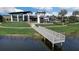 Relaxing boardwalk path leading to a peaceful lake at 6619 Current Dr, Apollo Beach, FL 33572