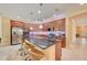 Modern kitchen featuring a large island, granite countertops and ample cabinetry at 6619 Current Dr, Apollo Beach, FL 33572