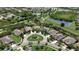 Aerial view of a residential neighborhood with houses, lakes, and landscaping at 6619 Current Dr, Apollo Beach, FL 33572
