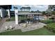 Covered patio area with seating near the pool at 6619 Current Dr, Apollo Beach, FL 33572