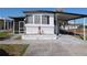 Front view of a white mobile home at 116 W Saint Johns Way, Apollo Beach, FL 33572